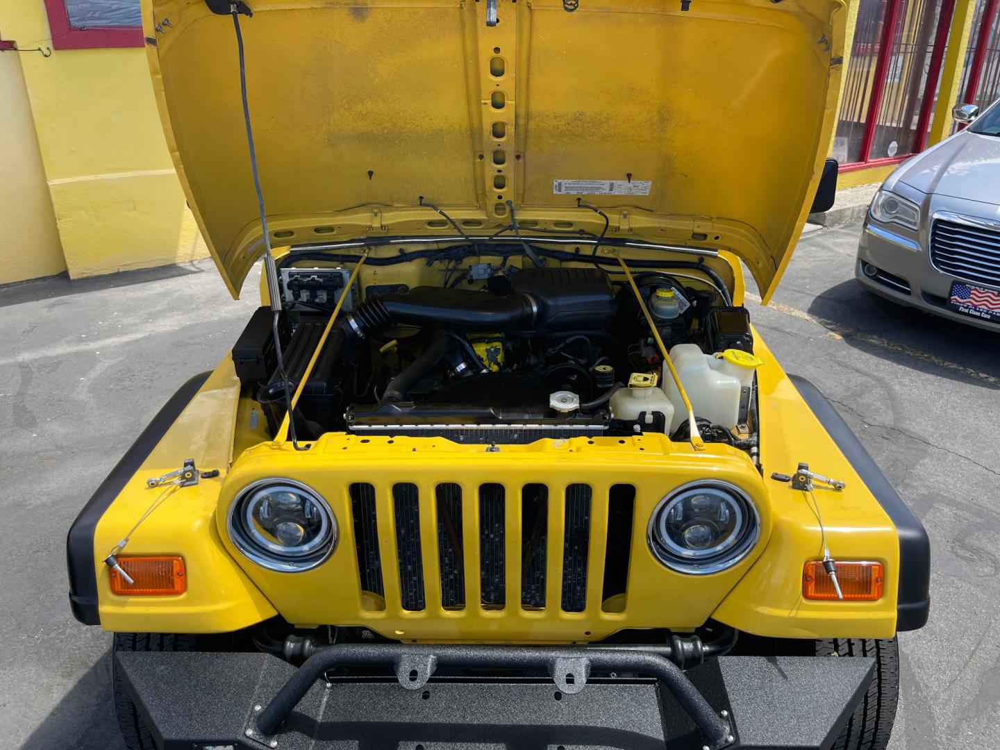 2000 Solar Yellow /Black Jeep Wrangler SE (1J4FA29P9YP) with an 2.5L 4 Cyl. engine, Manual transmission, located at 801 South State Street, Salt Lake City, UT, 84111, (801) 328-0098, 40.751953, -111.888206 - Wow extremely rare to find extra clean Jeep in immaculate condition 4x4! Low miles only 98,248 miles! Interior and exterior are both in excellent shape for the year. This is a clean title no reported accidents on the CarFax history report. It has passed emissions already and is ready to go. Featur - Photo#36